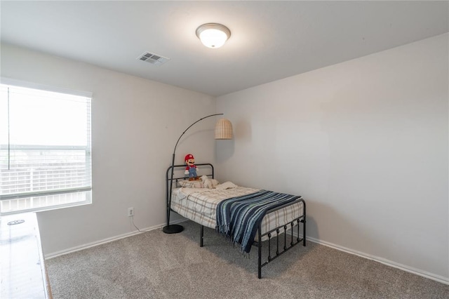 3429 Molly Dr, Yukon, OK 73099 - carpeted bedroom featuring baseboards