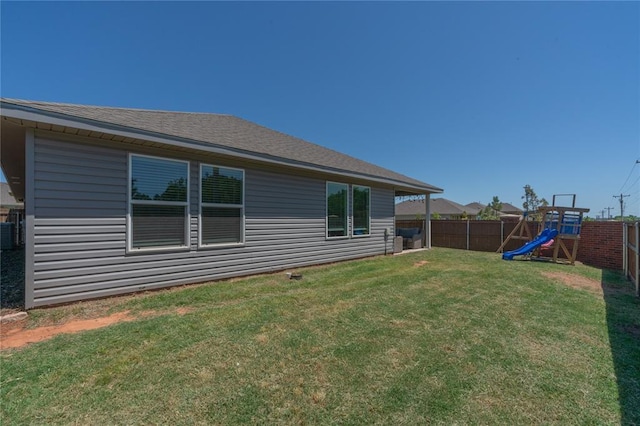 3429 Molly Dr, Yukon, OK 73099 - view of yard with a playground and central AC