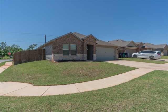 3429 Molly Dr, Yukon, OK 73099 - single story home with a garage, concrete driveway, and stone siding