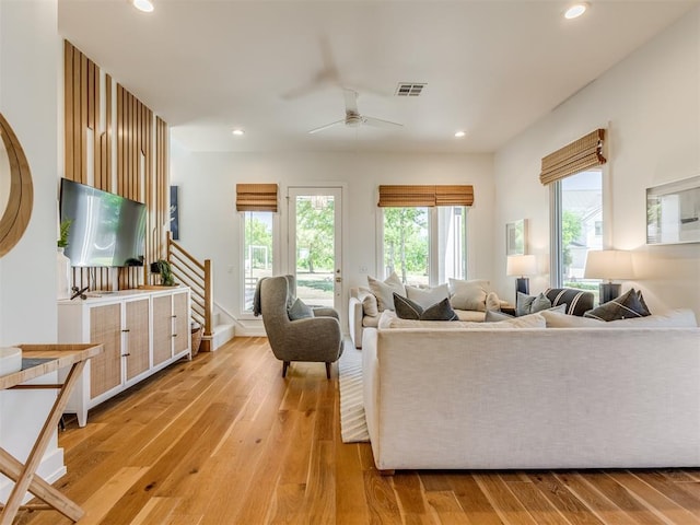 80 Pistache Ln, Carlton Landing, OK 74432 - living area featuring light wood-type flooring, a ceiling fan, stairway, and recessed lighting