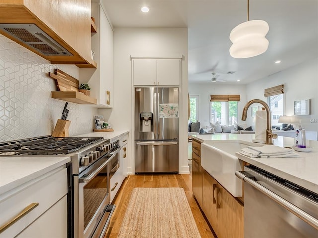 80 Pistache Ln, Carlton Landing, OK 74432 - kitchen featuring stainless steel appliances, light wood-style floors, light countertops, recessed lighting, and a ceiling fan