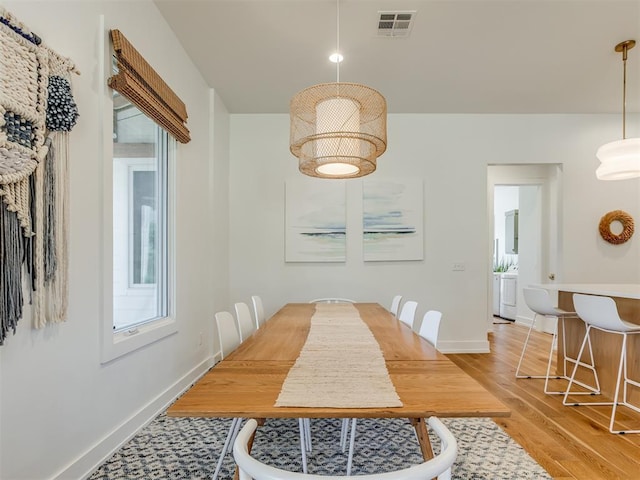 80 Pistache Ln, Carlton Landing, OK 74432 - dining room with light wood-style flooring, baseboards, and washer / dryer