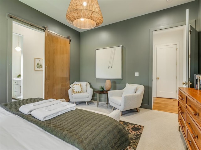 80 Pistache Ln, Carlton Landing, OK 74432 - bedroom with a barn door and light colored carpet