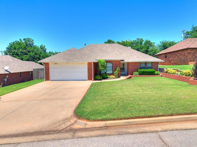 2601 Northwood Ln, Edmond, OK 73013 - ranch-style home featuring a garage, concrete driveway, brick siding, and a shingled roof