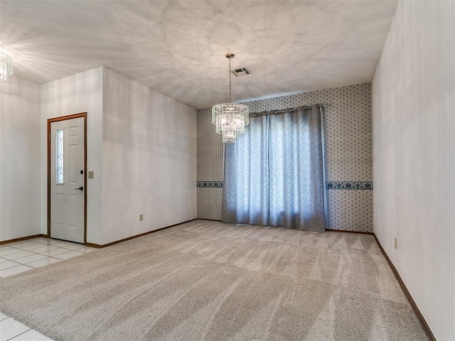 2601 Northwood Ln, Edmond, OK 73013 - unfurnished room featuring a chandelier, baseboards, carpet flooring, and tile patterned floors