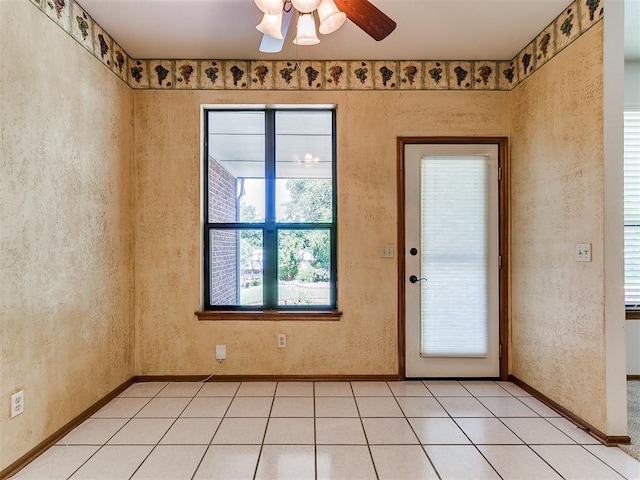 2601 Northwood Ln, Edmond, OK 73013 - foyer entrance with ceiling fan and baseboards