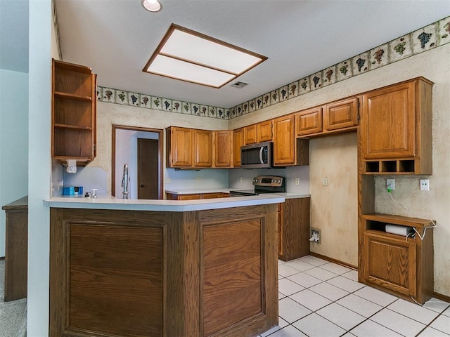 2601 Northwood Ln, Edmond, OK 73013 - kitchen featuring appliances with stainless steel finishes, open shelves, brown cabinets, a peninsula, and light countertops