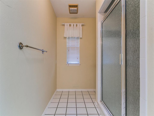 2601 Northwood Ln, Edmond, OK 73013 - full bathroom with a shower stall, baseboards, and tile patterned flooring