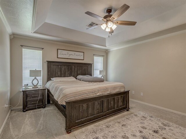 846 County St Unit 2910, Tuttle, OK 73089 - carpeted bedroom featuring a tray ceiling, baseboards, crown molding, and ceiling fan