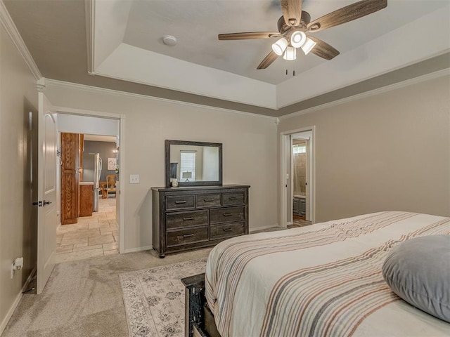 846 County St Unit 2910, Tuttle, OK 73089 - bedroom featuring a raised ceiling, baseboards, light colored carpet, ornamental molding, and a ceiling fan