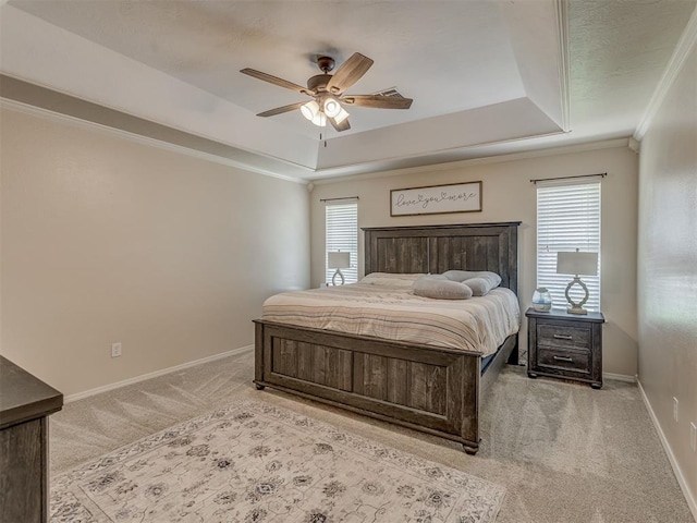 846 County St Unit 2910, Tuttle, OK 73089 - bedroom with light colored carpet, a raised ceiling, baseboards, ornamental molding, and a ceiling fan