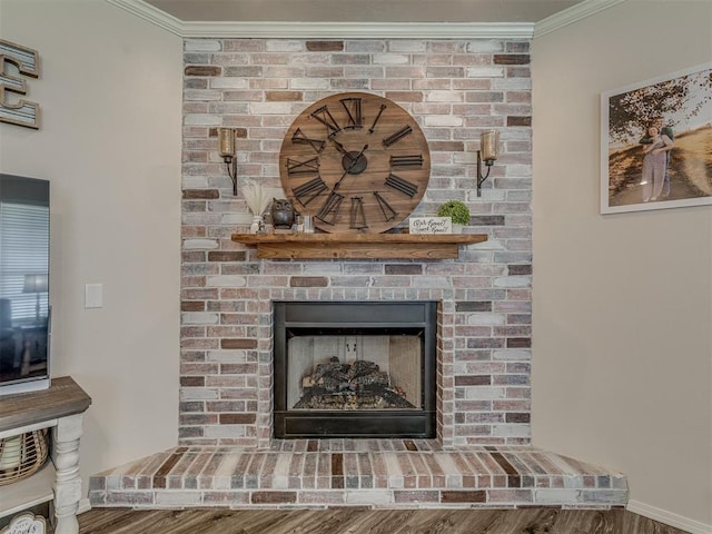846 County St Unit 2910, Tuttle, OK 73089 - detailed view of crown molding, a brick fireplace, and wood finished floors