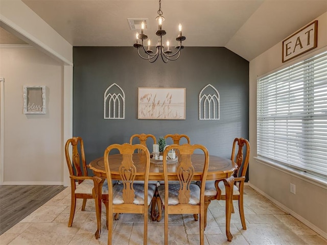 846 County St Unit 2910, Tuttle, OK 73089 - dining area with a chandelier, plenty of natural light, baseboards, and vaulted ceiling
