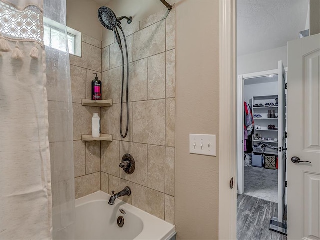 846 County St Unit 2910, Tuttle, OK 73089 - bathroom with shower / washtub combination and wood finished floors
