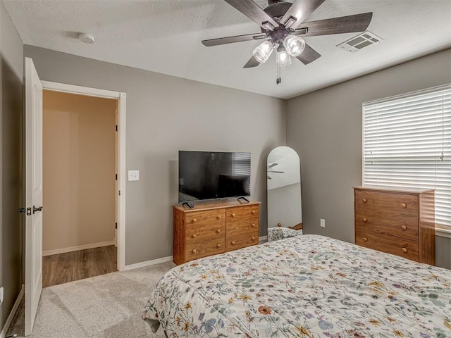 846 County St Unit 2910, Tuttle, OK 73089 - carpeted bedroom featuring baseboards and ceiling fan