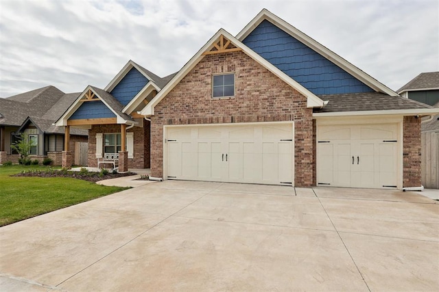 5804 NW 159th St, Edmond, OK 73013 - craftsman-style house with brick siding, driveway, a front yard, and a garage