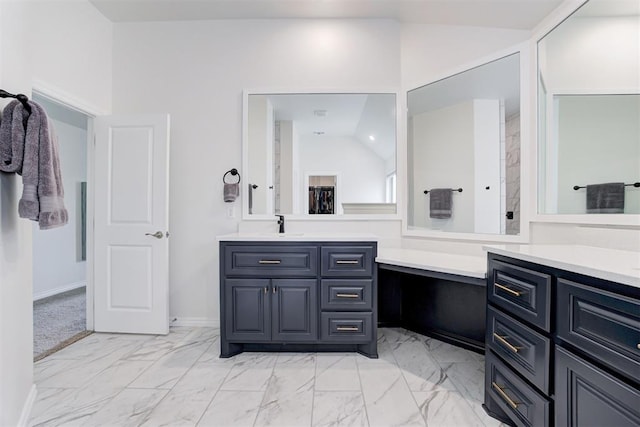 5804 NW 159th St, Edmond, OK 73013 - full bathroom with vanity, marble finish floors, and baseboards
