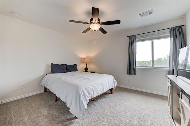 5804 NW 159th St, Edmond, OK 73013 - bedroom featuring light carpet, baseboards, and a ceiling fan
