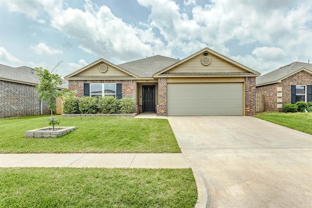 5318 Kye Dr, Tuttle, OK 73089 - view of front of property with a garage, brick siding, concrete driveway, and a front yard