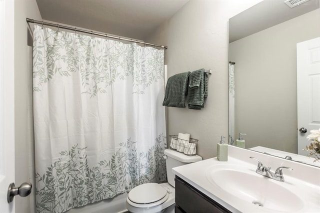 5318 Kye Dr, Tuttle, OK 73089 - bathroom featuring toilet, vanity, and shower / bathtub combination with curtain