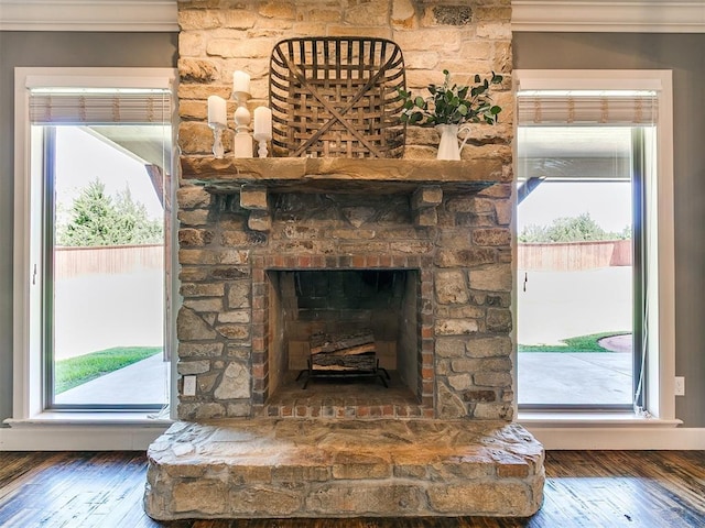 14210 Jack Rabbit Trl, Arcadia, OK 73007 - detailed view of wood finished floors and a stone fireplace