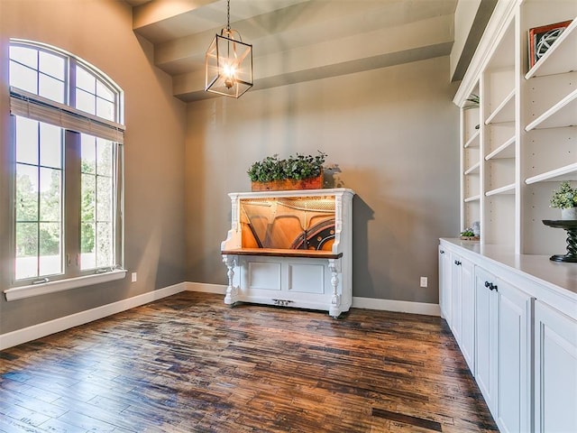 14210 Jack Rabbit Trl, Arcadia, OK 73007 - office space featuring dark wood finished floors, baseboards, and a chandelier