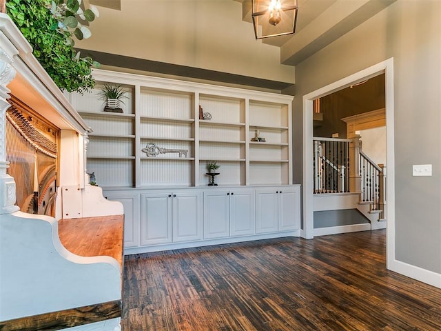 14210 Jack Rabbit Trl, Arcadia, OK 73007 - entrance foyer featuring stairway, dark wood finished floors, and baseboards