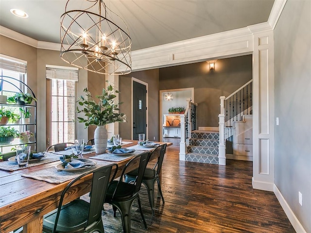 14210 Jack Rabbit Trl, Arcadia, OK 73007 - dining space with dark wood-style floors, ornamental molding, stairs, a chandelier, and baseboards