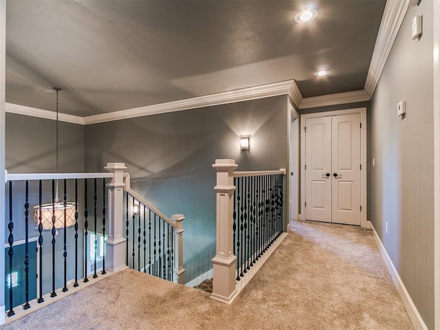 14210 Jack Rabbit Trl, Arcadia, OK 73007 - hallway with an upstairs landing, ornamental molding, carpet floors, and baseboards