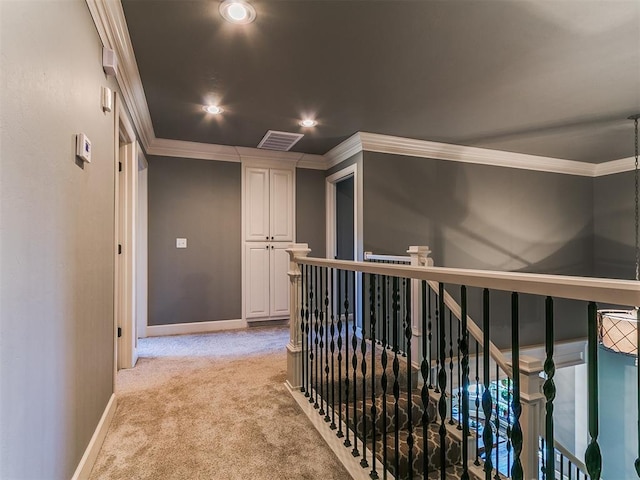 14210 Jack Rabbit Trl, Arcadia, OK 73007 - corridor with crown molding, baseboards, light colored carpet, an upstairs landing, and recessed lighting