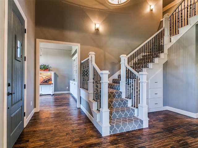 14210 Jack Rabbit Trl, Arcadia, OK 73007 - foyer featuring wood finished floors, stairway, and baseboards