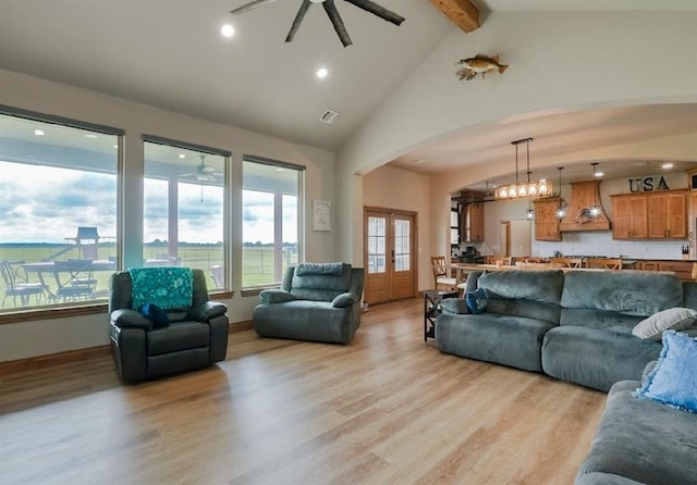 9027 Ns 3500th Rd, Prague, OK 74864 - living room with a ceiling fan, light wood-type flooring, arched walkways, recessed lighting, and french doors
