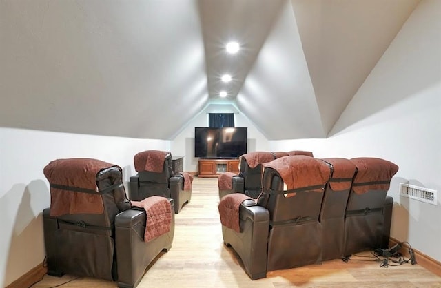 9027 Ns 3500th Rd, Prague, OK 74864 - cinema featuring lofted ceiling, light wood-style floors, and baseboards