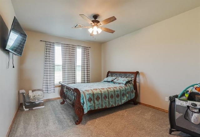 9027 Ns 3500th Rd, Prague, OK 74864 - carpeted bedroom featuring baseboards and a ceiling fan