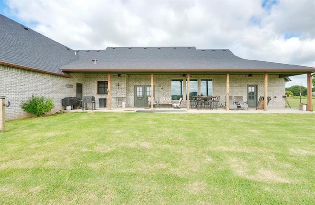 9027 Ns 3500th Rd, Prague, OK 74864 - rear view of property with a lawn, a ceiling fan, and a patio