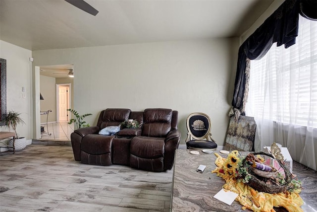 3117 Lazy Ln, Del City, OK 73115 - living room with a ceiling fan and wood finished floors