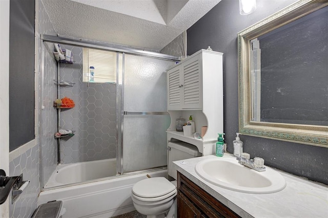 3117 Lazy Ln, Del City, OK 73115 - bathroom with vanity, toilet, bath / shower combo with glass door, and a textured ceiling