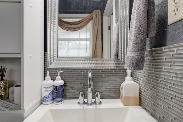3117 Lazy Ln, Del City, OK 73115 - bathroom featuring a sink and backsplash