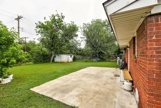 3117 Lazy Ln, Del City, OK 73115 - view of green lawn with a patio