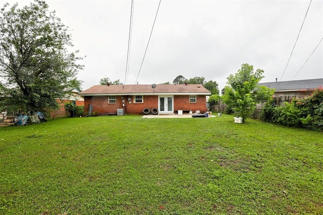 3117 Lazy Ln, Del City, OK 73115 - rear view of property with french doors, a patio, brick siding, and central AC unit