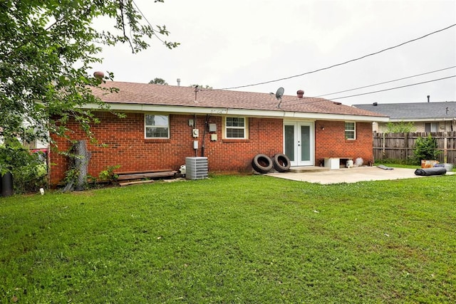 3117 Lazy Ln, Del City, OK 73115 - rear view of property featuring a patio, brick siding, french doors, and central AC unit