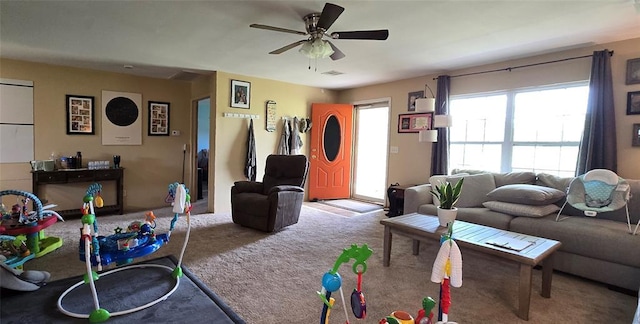 36797 N 56th Hwy, Okemah, OK 74859 - carpeted living room with ceiling fan
