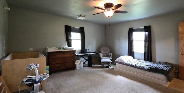 36797 N 56th Hwy, Okemah, OK 74859 - bedroom featuring carpet floors and a ceiling fan