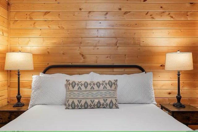 173 Alexis Ln, Broken Bow, OK 74728 - bedroom featuring wooden walls
