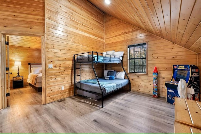 173 Alexis Ln, Broken Bow, OK 74728 - bedroom featuring lofted ceiling, wood walls, wood ceiling, and wood finished floors
