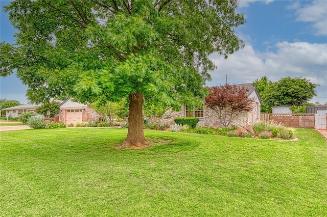 1301 W C Ave, Elk City, OK 73644 - view of yard with an attached garage