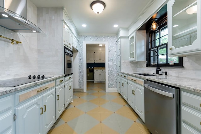 1301 W C Ave, Elk City, OK 73644 - kitchen featuring stainless steel appliances, wall chimney exhaust hood, ornamental molding, backsplash, and white cabinetry