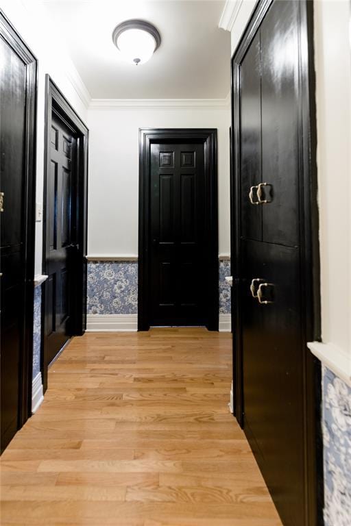 1301 W C Ave, Elk City, OK 73644 - corridor featuring light wood-type flooring, ornamental molding, and baseboards