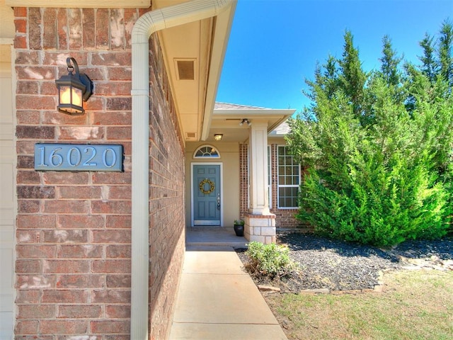 16020 Panther Way, Edmond, OK 73013 - entrance to property with brick siding