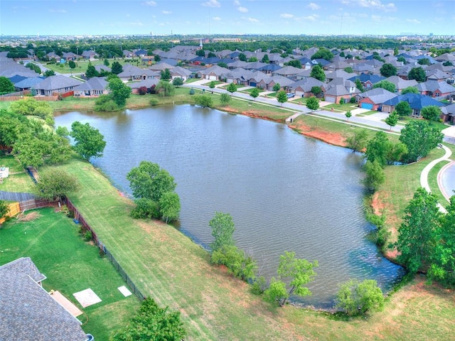 16020 Panther Way, Edmond, OK 73013 - aerial view of property and surrounding area with a large body of water and nearby suburban area